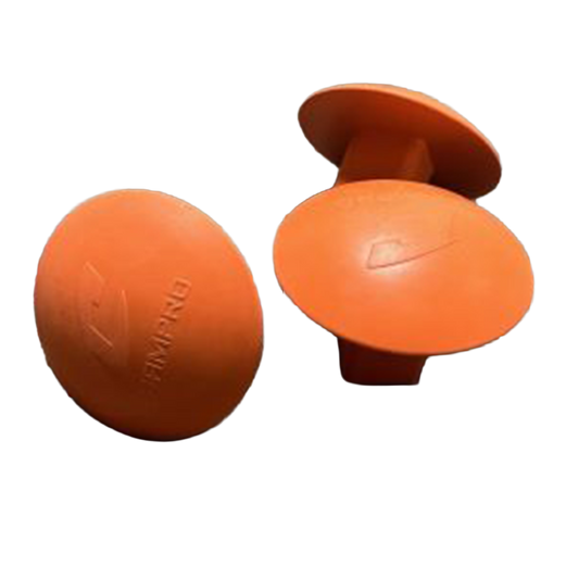 Three orange Champro base plugs