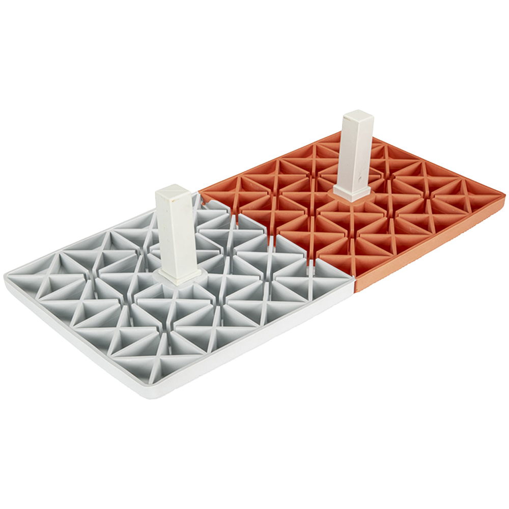 Two Champro Bases upside down showing the anchors in the middle