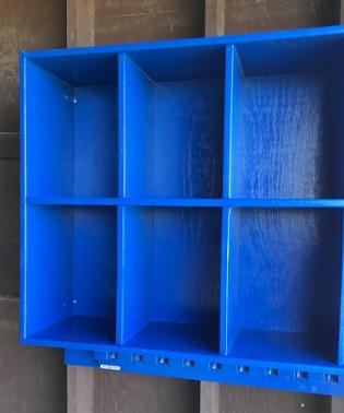 A blue 6 Helmet Combo Rack with multiple compartments, designed to hold baseball or softball helmets and bats.