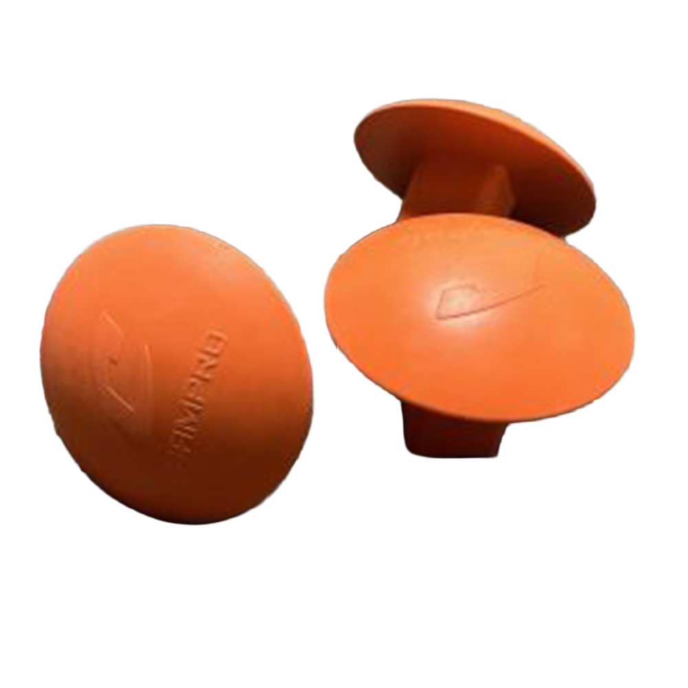 Three orange Champro base plugs