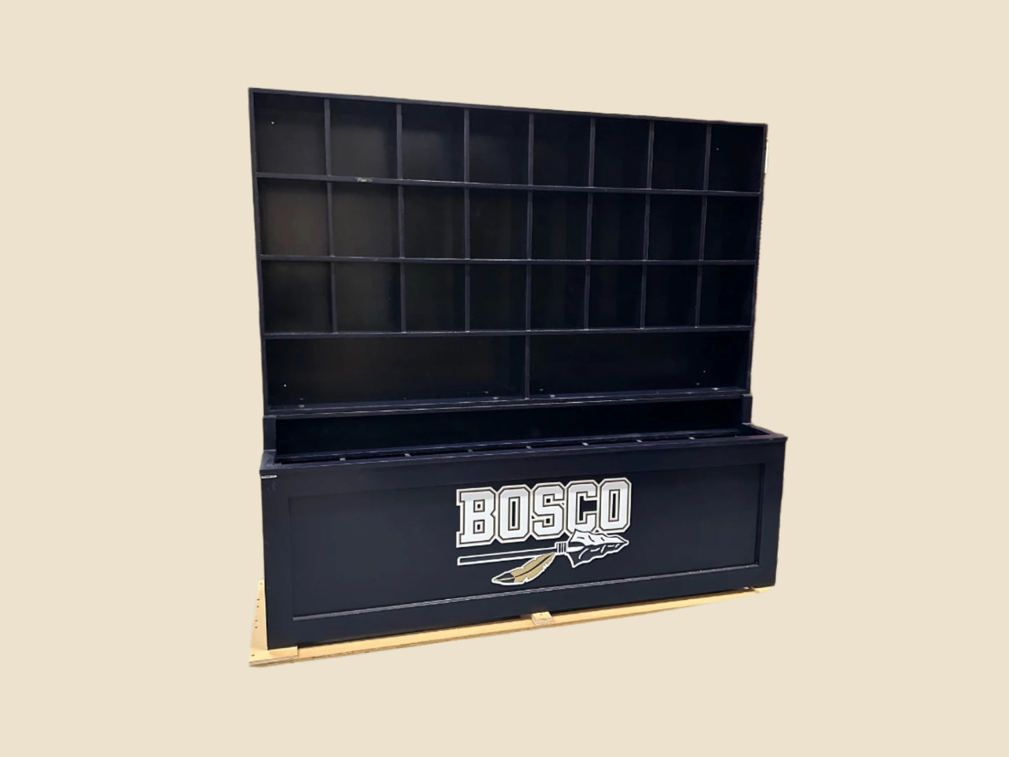 Large black storage bin with 'BOSCO' branding on a pallet in a warehouse setting.
