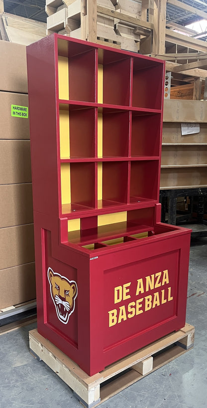 Red storage unit with 'De Anza Baseball' text and panther logo on a pallet.
