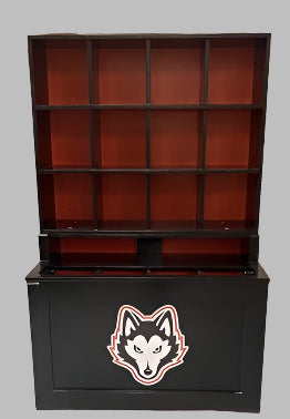 A black wooden helmet and bat rack combination unit with a team logo on the front. The unit has multiple helmet cubbies, bat compartments, and a lower base.