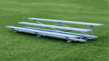Low Rise Dura-Lite Welded Portable Bleachers 3 rows on Grass Background