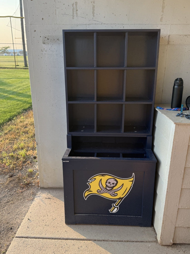 Black storage unit with a logo on a concrete surface outdoors