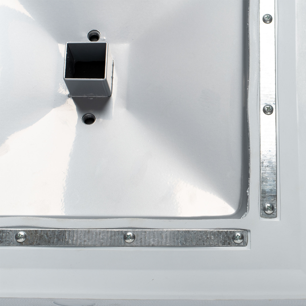 Close up of the underneath of a champro base showing the metal with screws and the socket