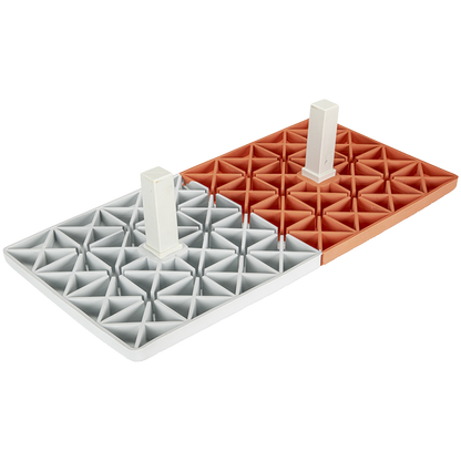 Two Champro Bases upside down showing the anchors in the middle