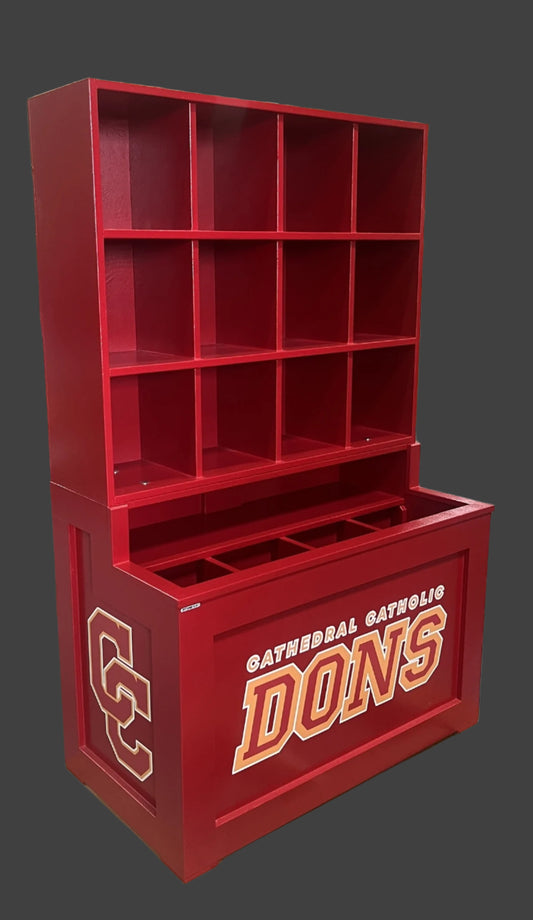 Red bookshelf with 'Cathedral Catholic Dons' branding on a wooden pallet.