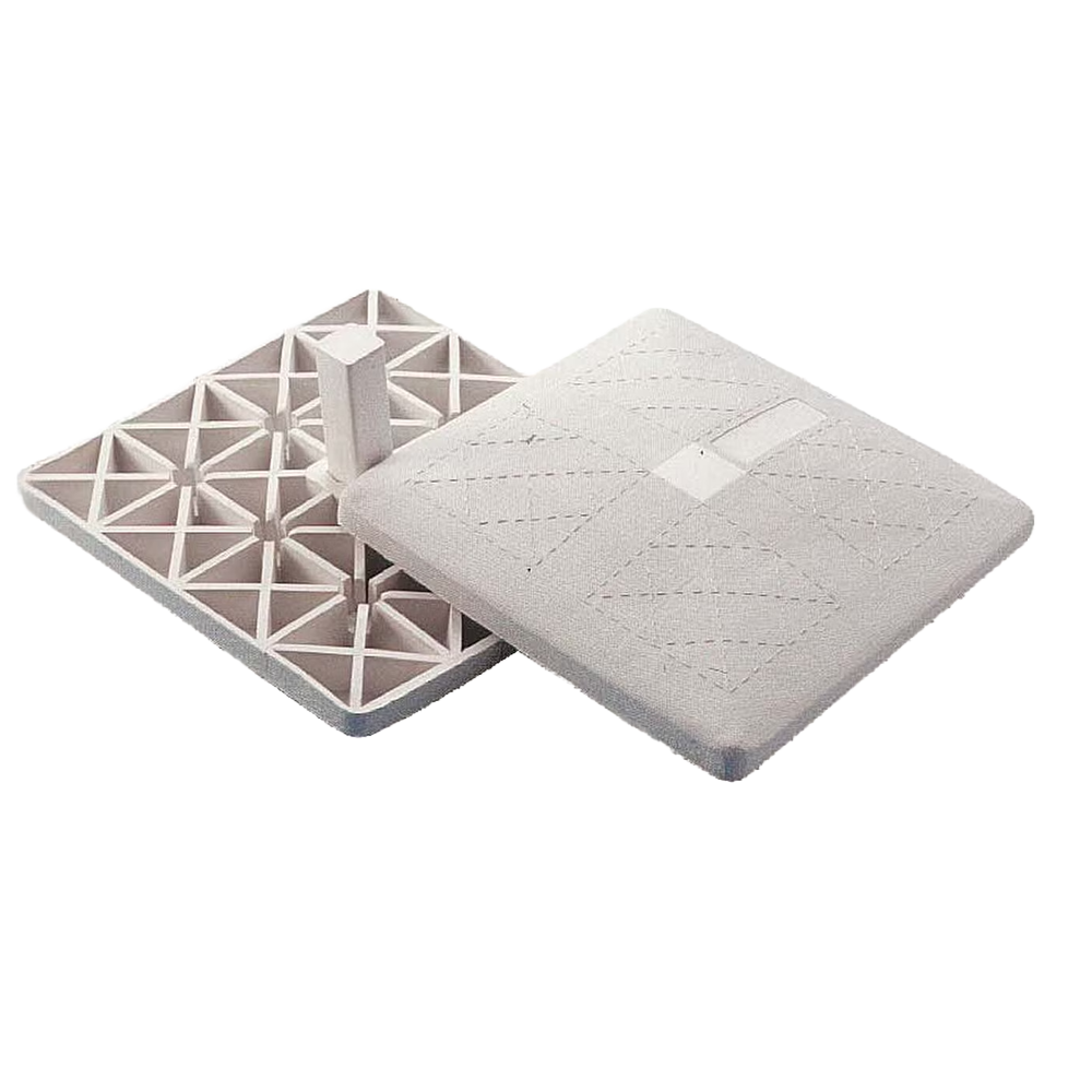 Top and bottom of white Trigon molded rubber base. 