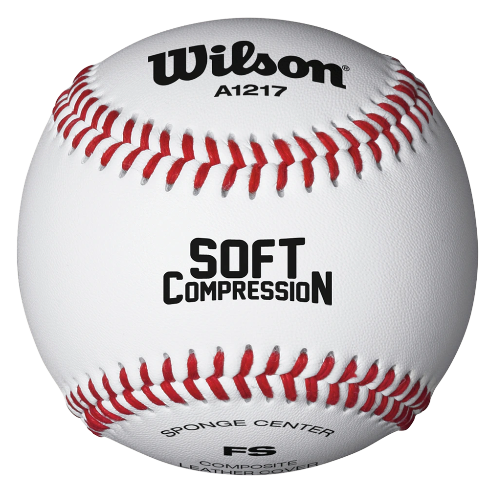 Wilson Baseball with A1217 text underneath logo and Soft Compression in the middle with Sponge Center at the bottom. White leather with red stitches. 
