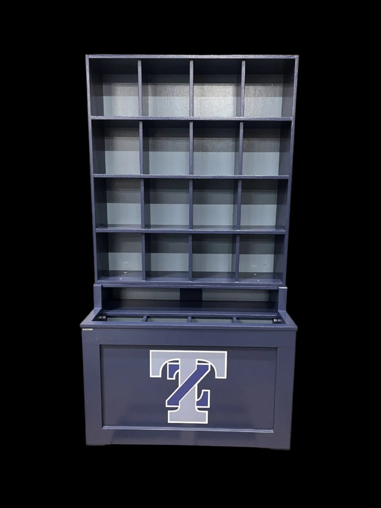 Blue storage unit with a logo on a pallet in a warehouse setting